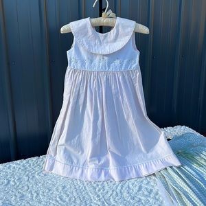 Pale pale pink and White …embroidered on top.   Simple tie and button back